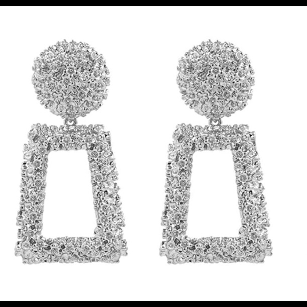 Door knocker style silver earrings